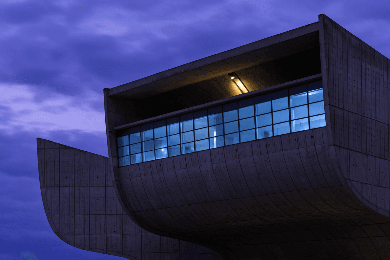 Brutalist concrete museum against a violet twilight sky
